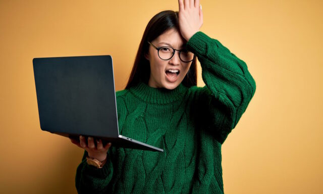 Confused woman with laptop