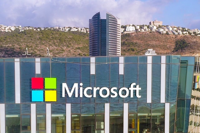 Microsoft logo on glass building